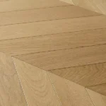 Close-up angle of oak chevron floor planks