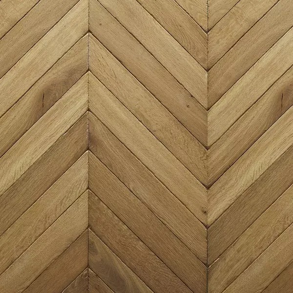 Close-up of natural oak chevron parquet