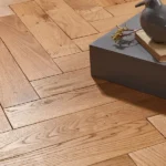 Close-up of oak herringbone parquet flooring