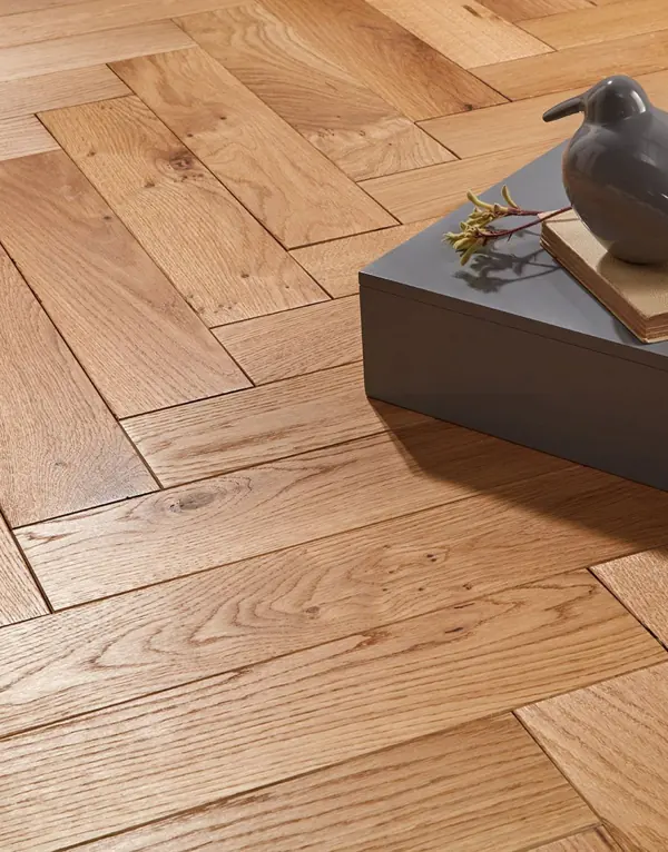 Close-up of oak herringbone parquet flooring