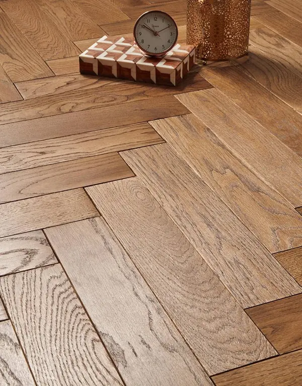 Close-up of oak herringbone wood floor planks
