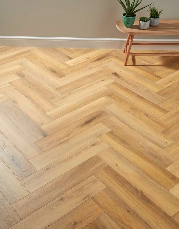 Light oak herringbone flooring in a modern room