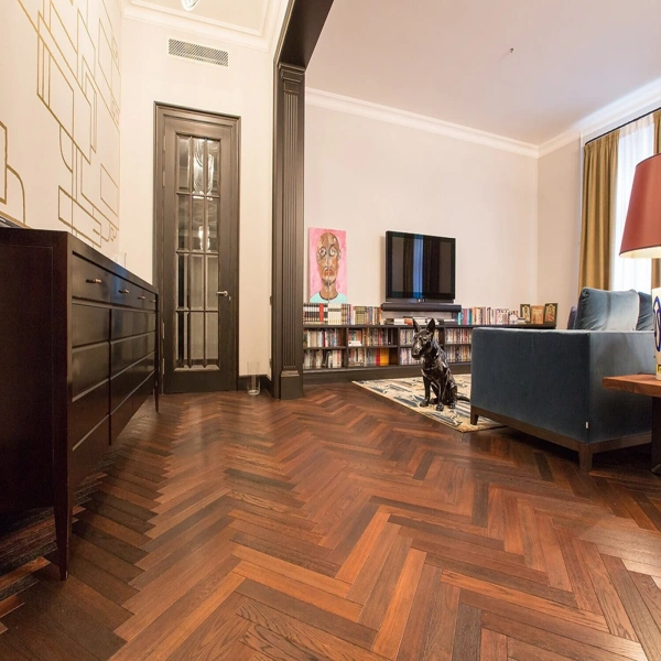 Modern study with dark mahogany chevron floors