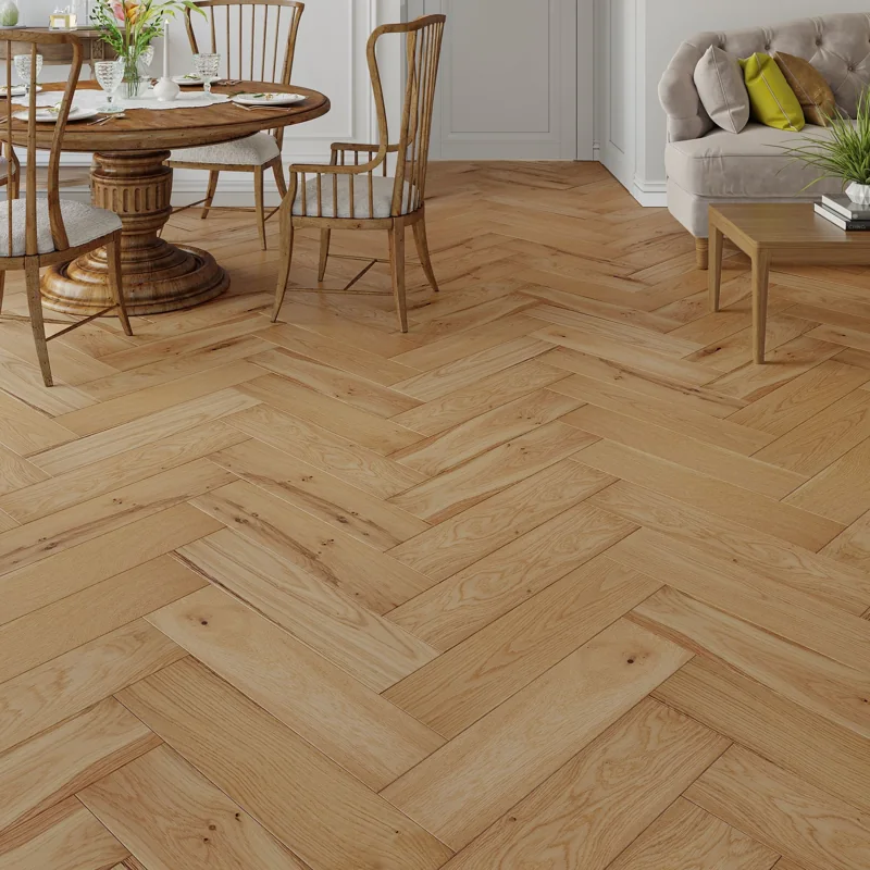 Modern wide-plank herringbone wood flooring.