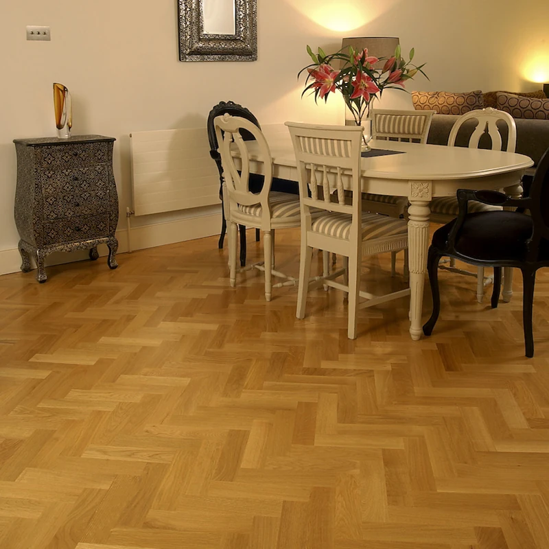 Traditional oak herringbone dining room floor.