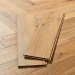 Two light oak floor planks with tongue and groove