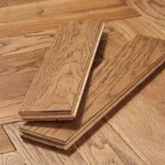Two tongue and groove oak parquet flooring blocks