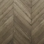 Weathered oak chevron parquet flooring.