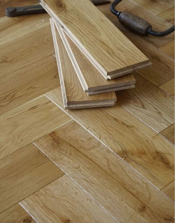 oak parquet flooring with a subtle, matte finish and visible wood grain texture