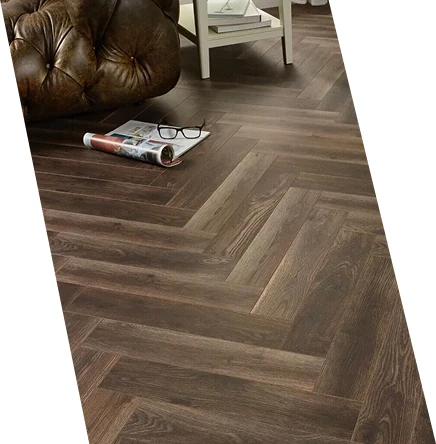 Dark oak herringbone parquet flooring in cozy interior