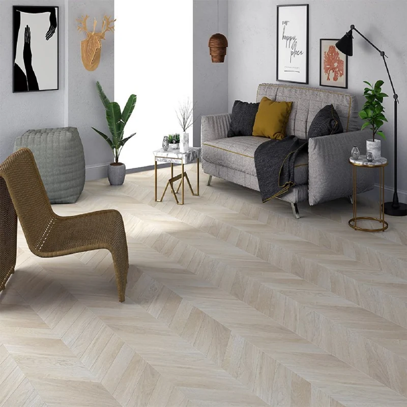 Light beige chevron wood flooring in a modern living room.