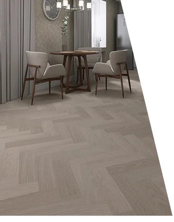 Light grey herringbone wood flooring in a modern living room.