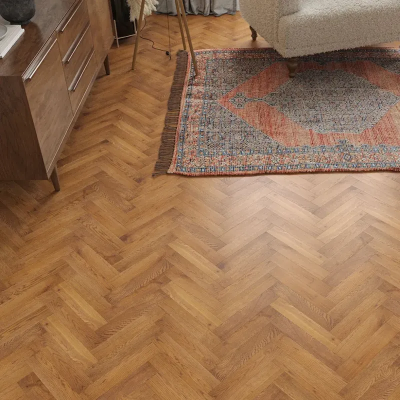 Light oak herringbone wood parquet flooring in living room
