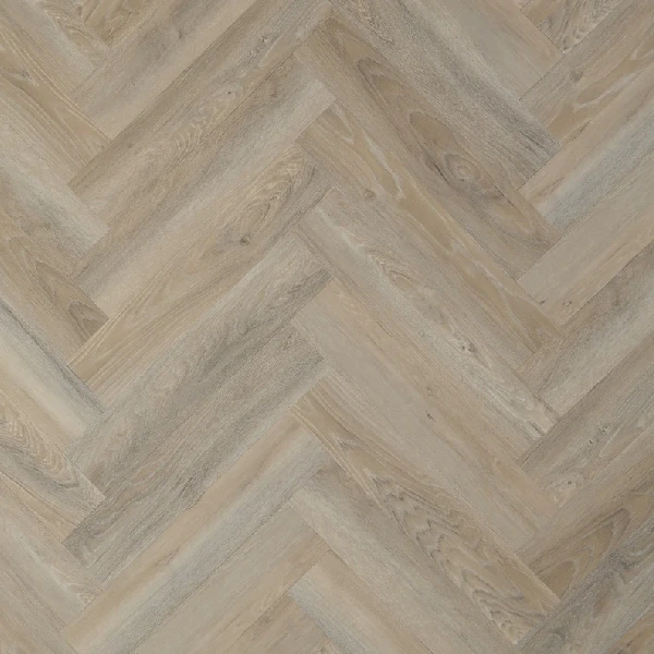 Washed grey wood-effect LVT flooring in a herringbone pattern