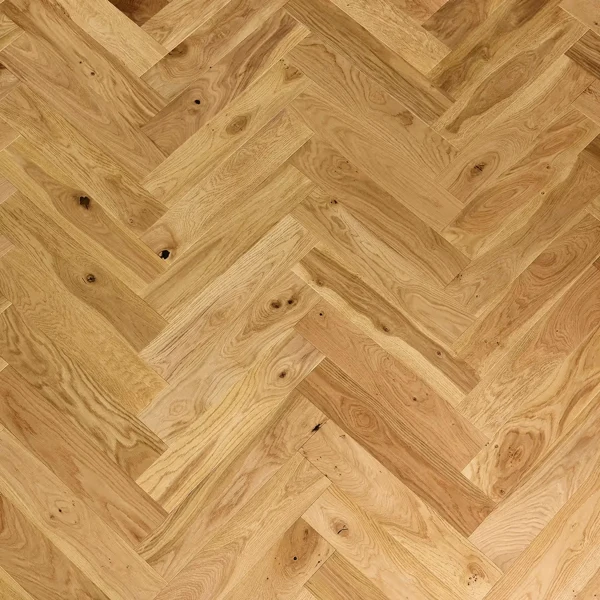 Close-up view of natural oak engineered parquet flooring
