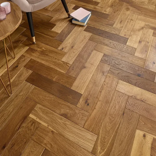 Lacquered golden oak herringbone parquet flooring