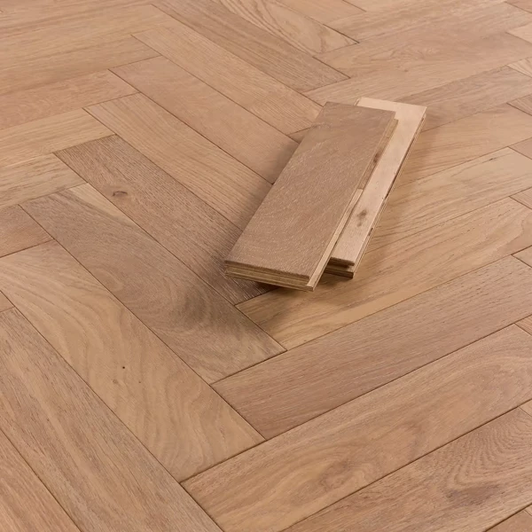 Light-toned engineered parquet flooring planks