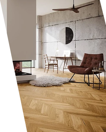 Natural oak chevron parquet flooring in a modern living space with a fireplace