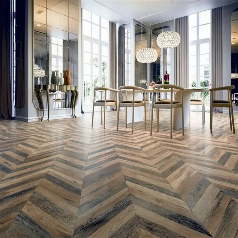 Waterproof chevron parquet wood flooring in a modern dining room