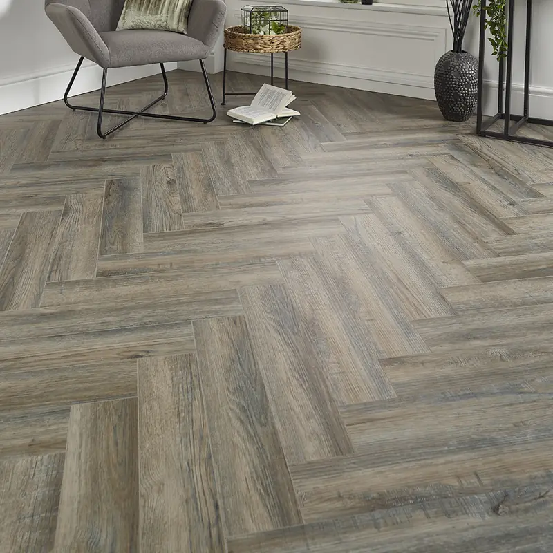 Waterproof herringbone parquet flooring in a modern living room interior